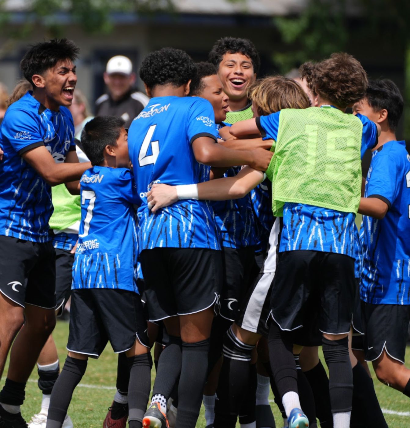 Oregon Surf players celebrating together on the field